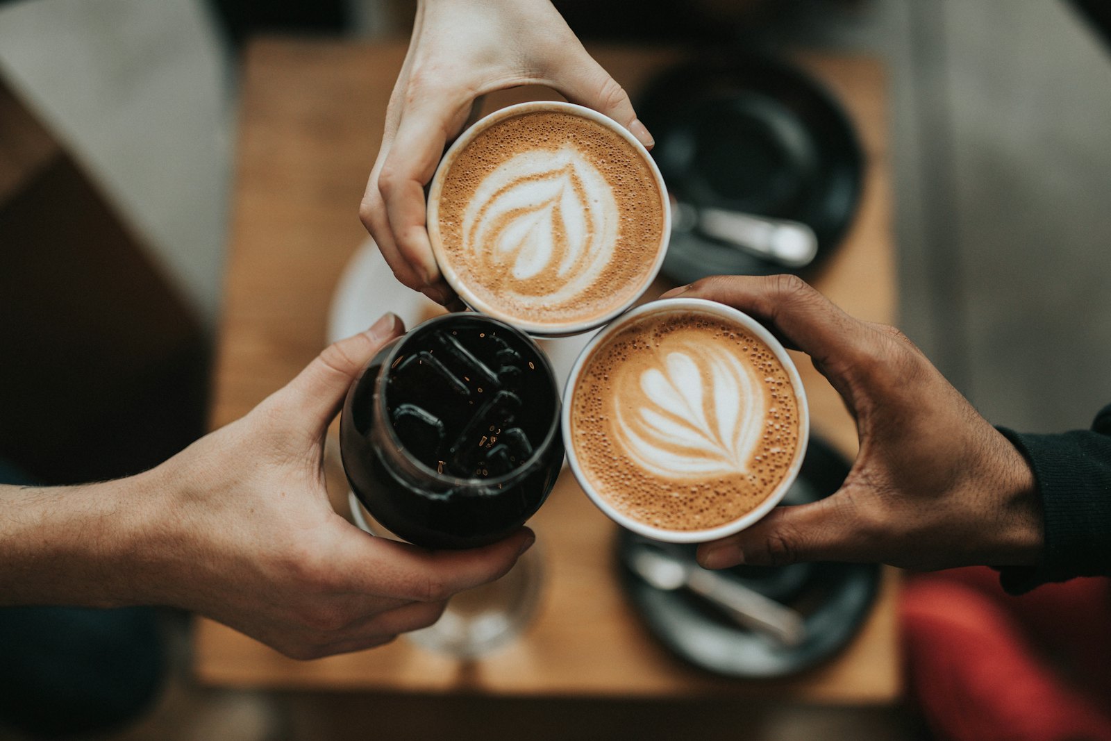 Three lattes with latte art