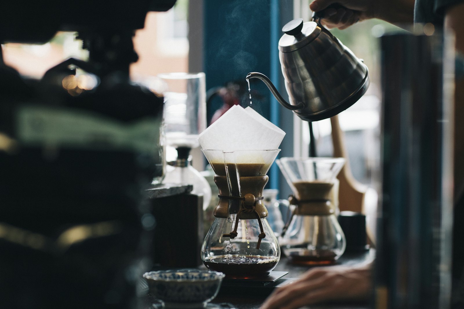 Barista making a pour over