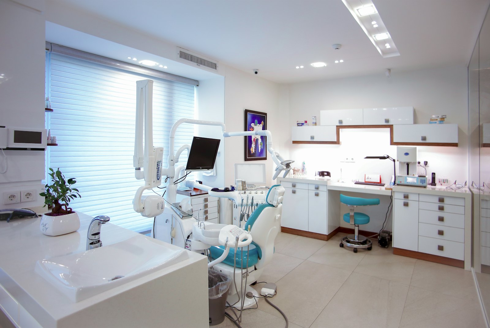Bright treatment room with a modern dental chair