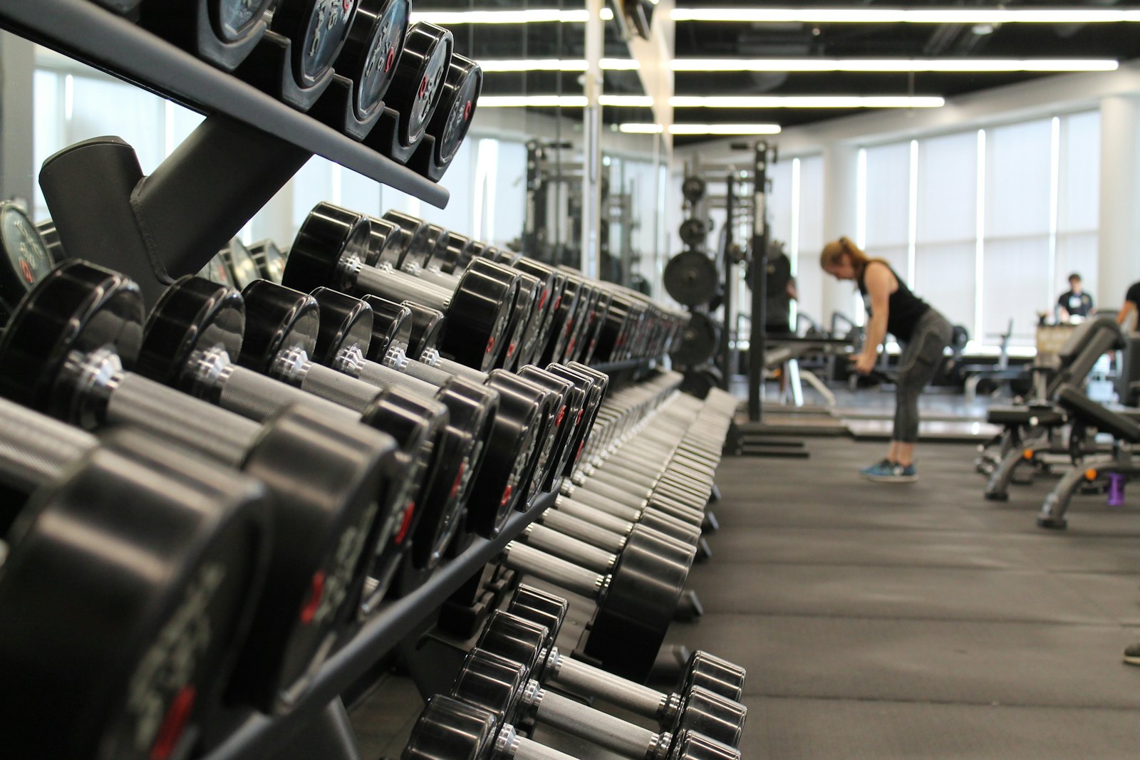 Barbell with plates on a gym floor