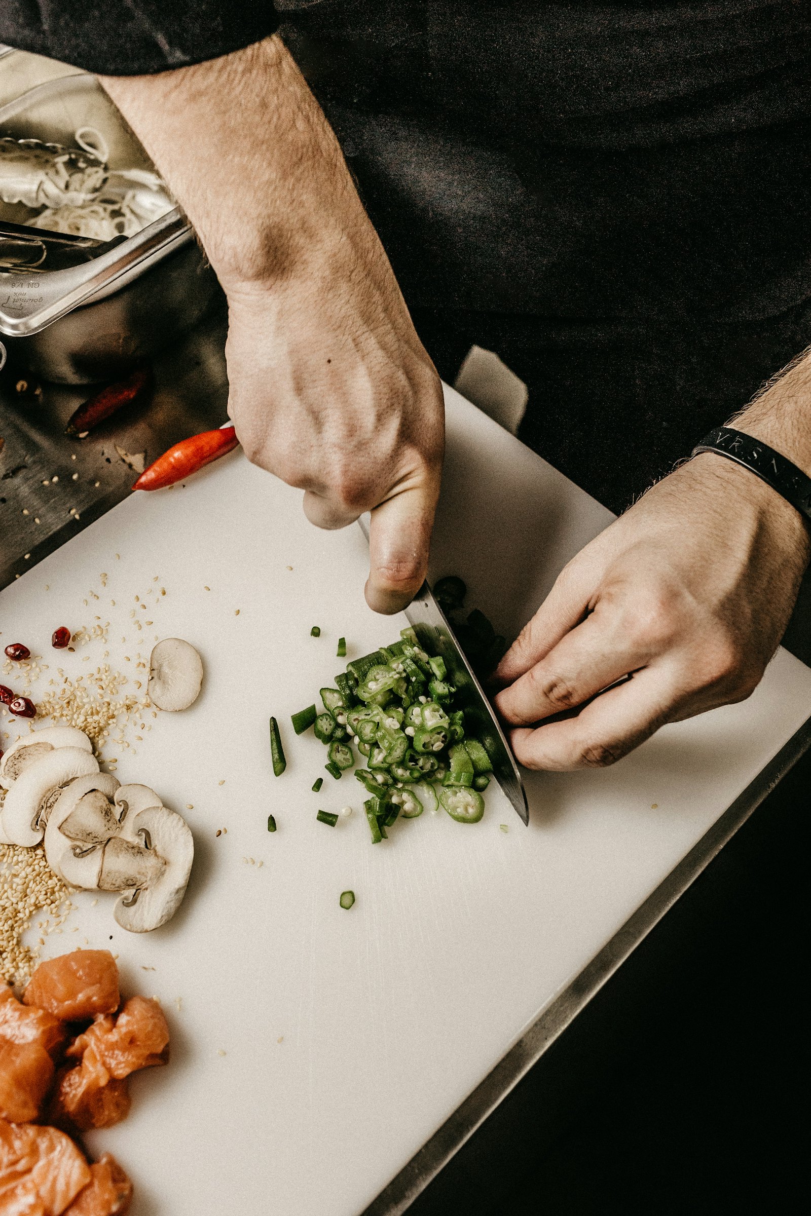 Chef chopping fresh herbs